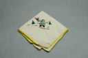 Image of Girl with flowers. One of a set of 4 embroidered napkins, each with figure at play, 